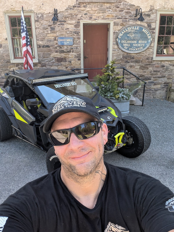 Wayne with the Discovery SXS quadricycle at Prallsville Mills